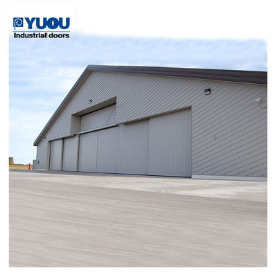 Steel Automatic Aircraft Hangar Door Revolving PU Sandwich Panel 50HZ 5000kg leaf